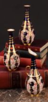 A pair of Royal Crown Derby 1128 Imari pattern ovoid bottle vases, the slender necks moulded with