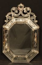 An early 20th century Venetian looking glass, bevelled octagonal mirror plate, 98cm high, 61cm wide