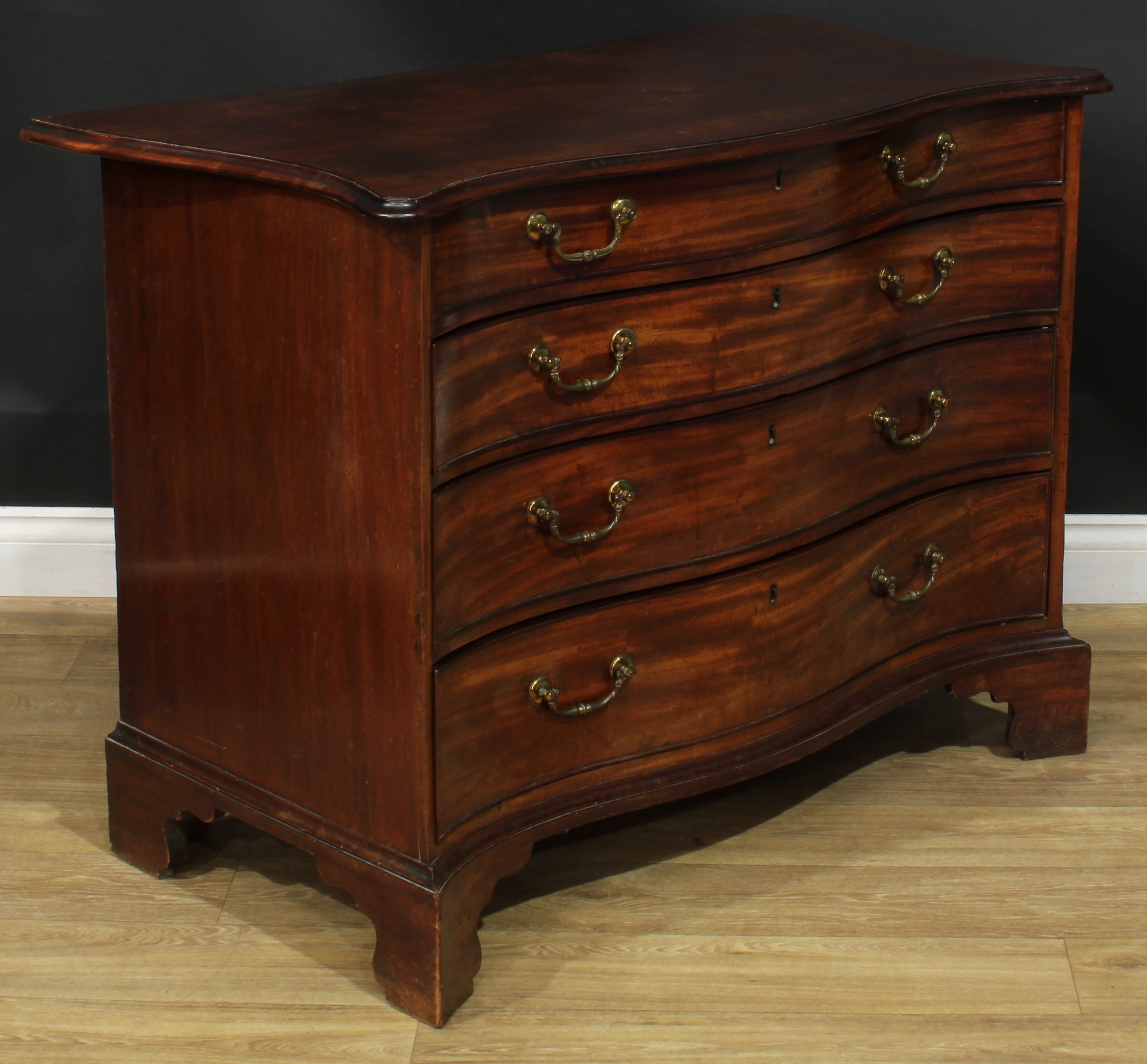 A George III mahogany serpentine chest, slightly oversailing top with moulded edge above four long - Image 2 of 5