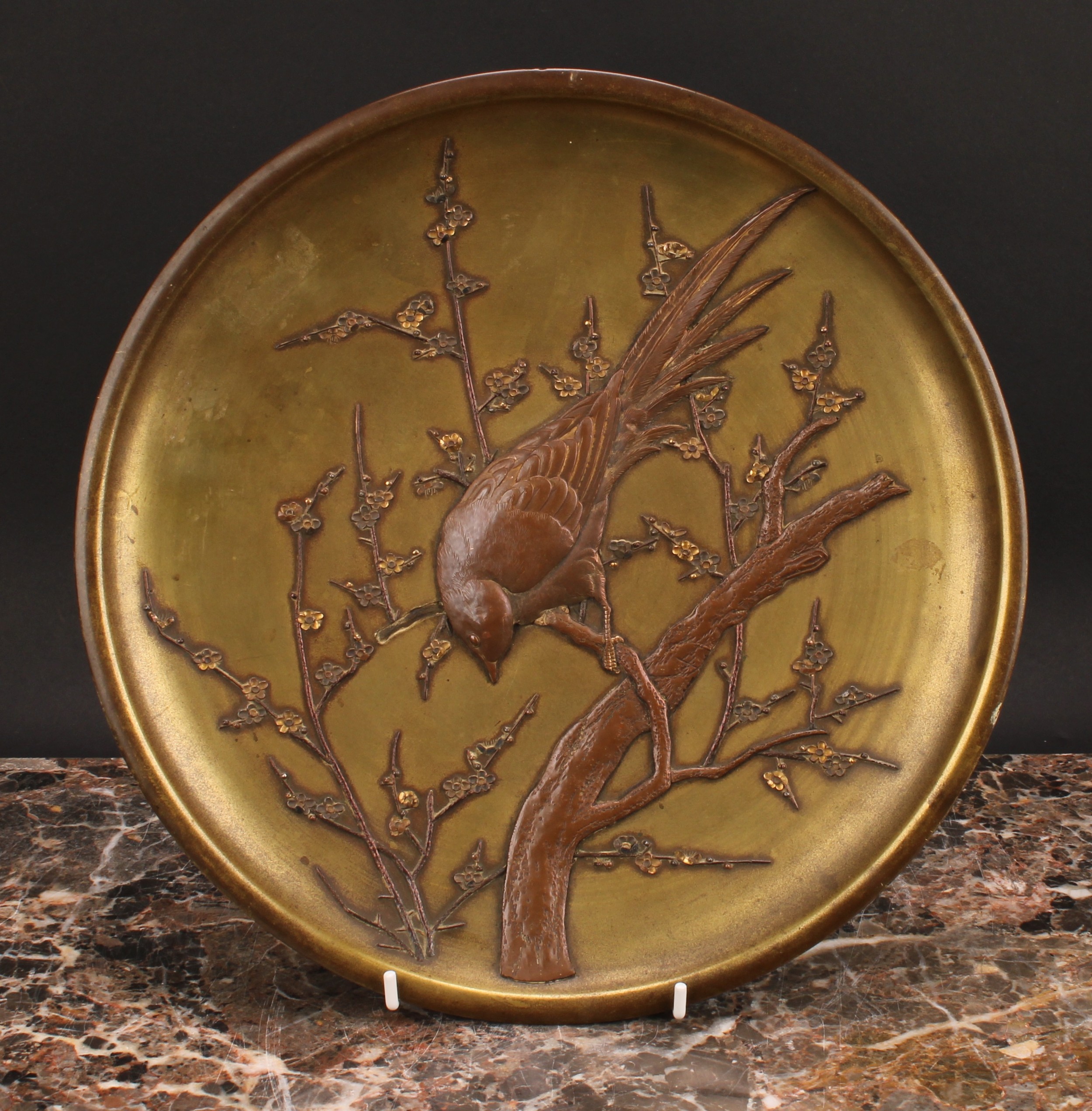 A Japanese gilt and brown patinated bronze dish or charger, applied with a bird perched on a - Image 2 of 3