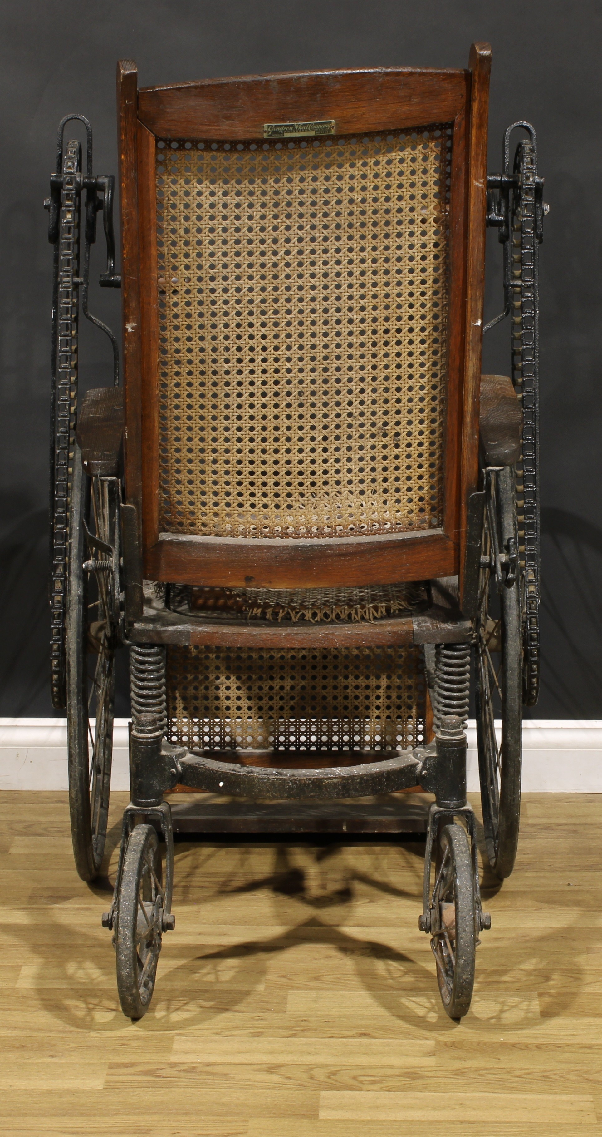 An early to mid-20th century American oak hand-crank wheelchair, by Gendron Wheel Company, - Image 4 of 5