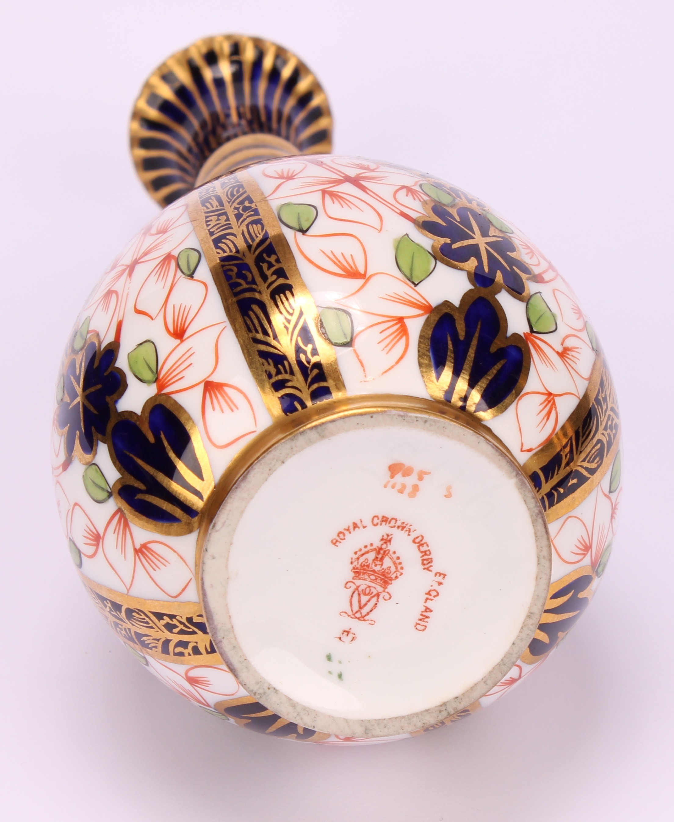 A pair of Royal Crown Derby 1128 Imari pattern ovoid bottle vases, the slender necks moulded with - Image 5 of 10