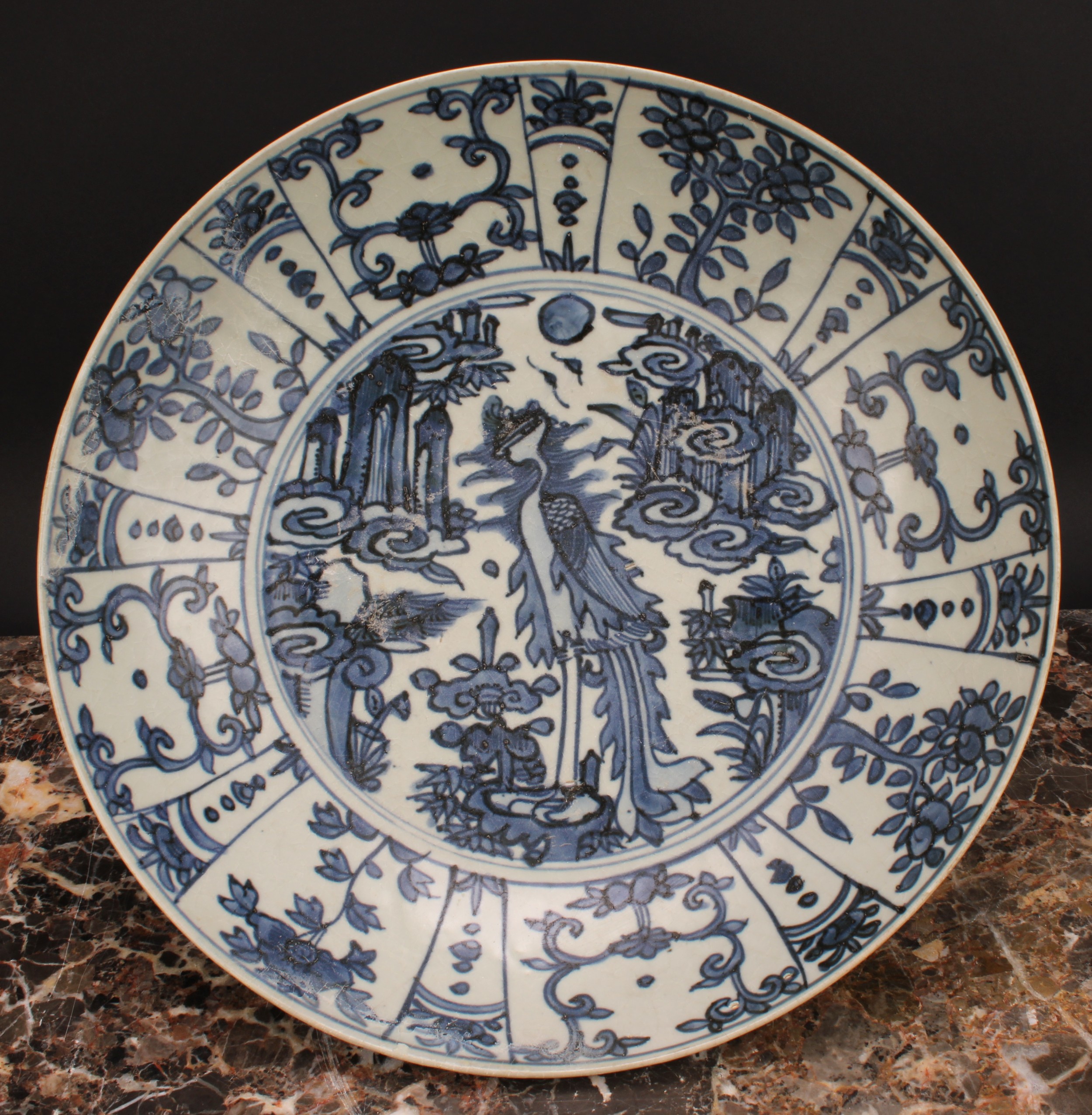 A pair of 17th century Chinese shipwreck porcelain dishes, painted in tones of underglaze blue - Image 4 of 5