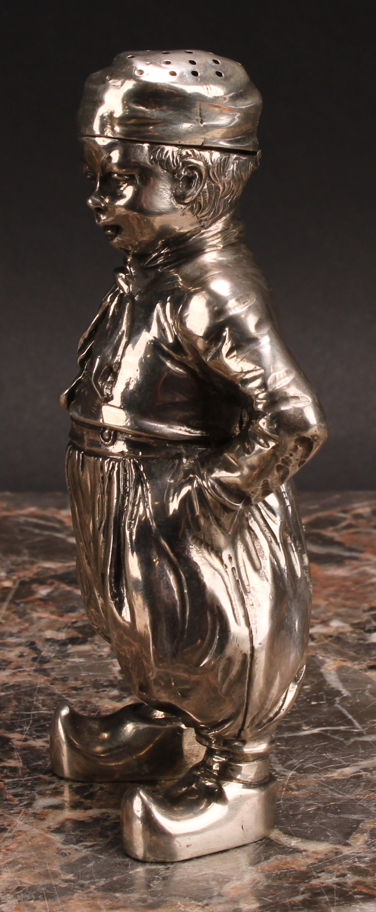 A German cast silver novelty pepper, as a young Dutch boy, he stands, with hands in pockets, 12. - Image 3 of 5