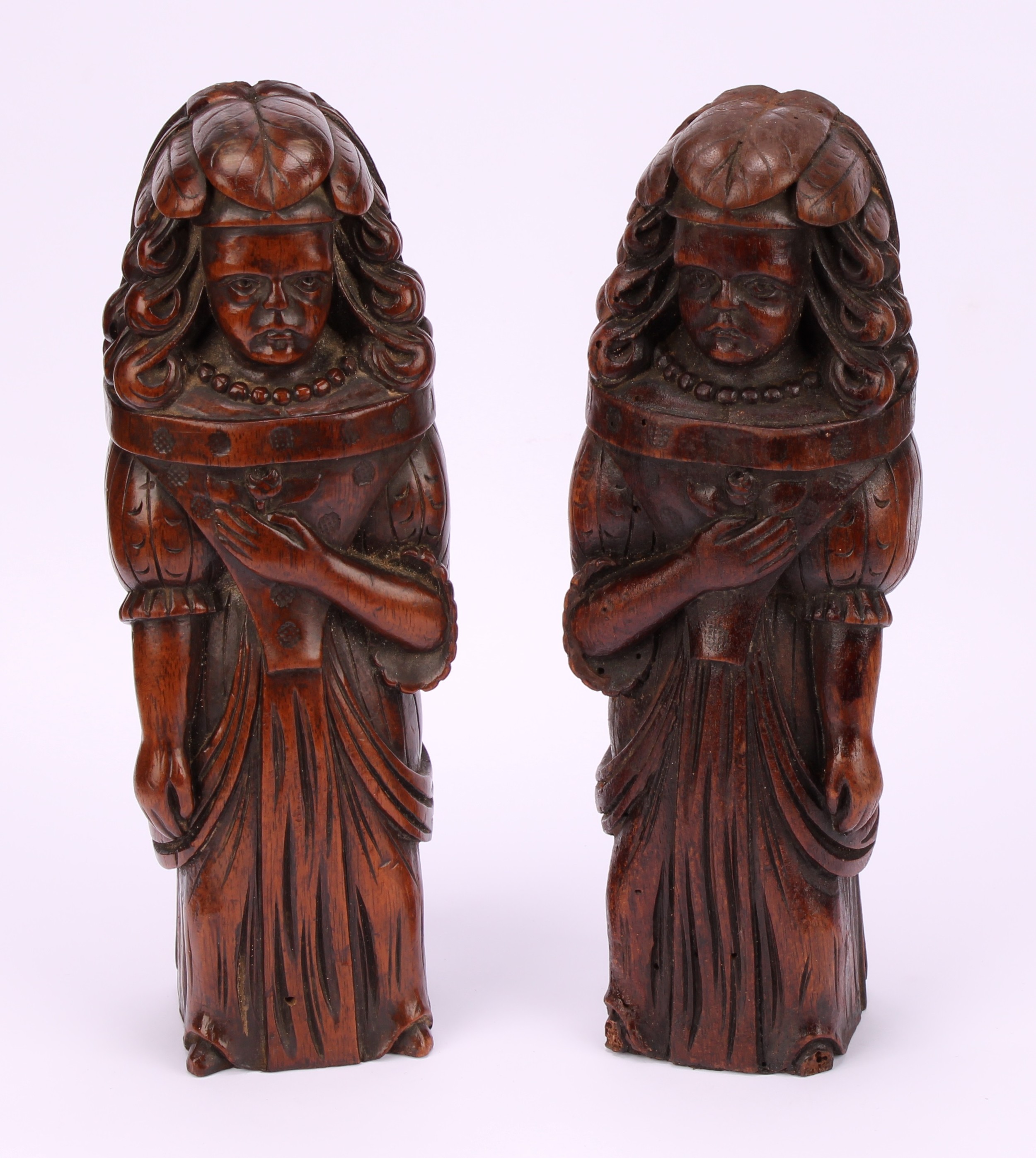 A pair of Continental walnut appliques, each carved as a lady of the court holding a flower to her - Image 2 of 4