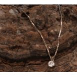 A diamond solitaire pendant, the round brilliant cut stone claw set, approximately 0.8ct diamond