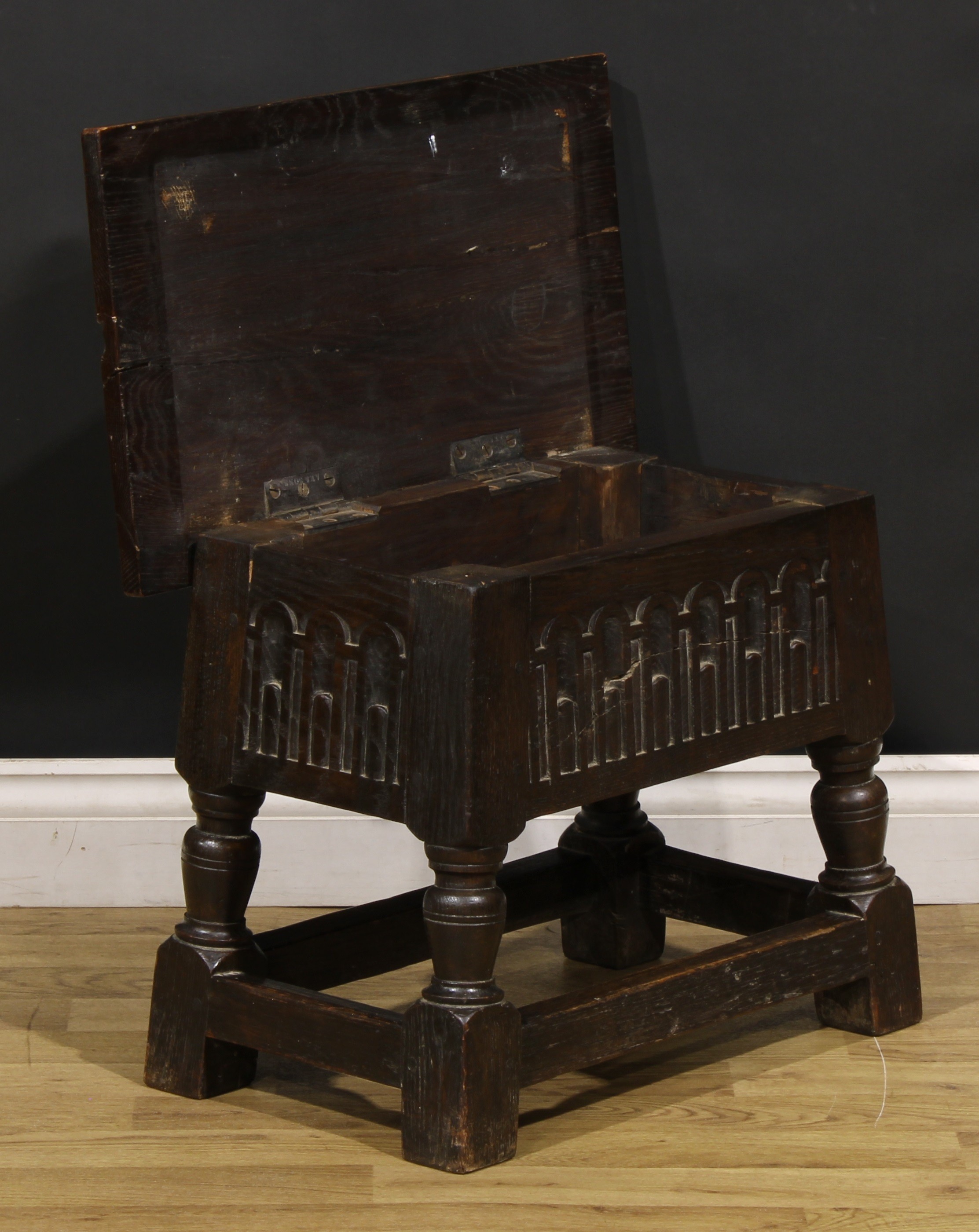 A Charles II style oak box stool, hinged top above a stop-nulled frieze, 43.5cm high, 54cm wide, - Image 3 of 5