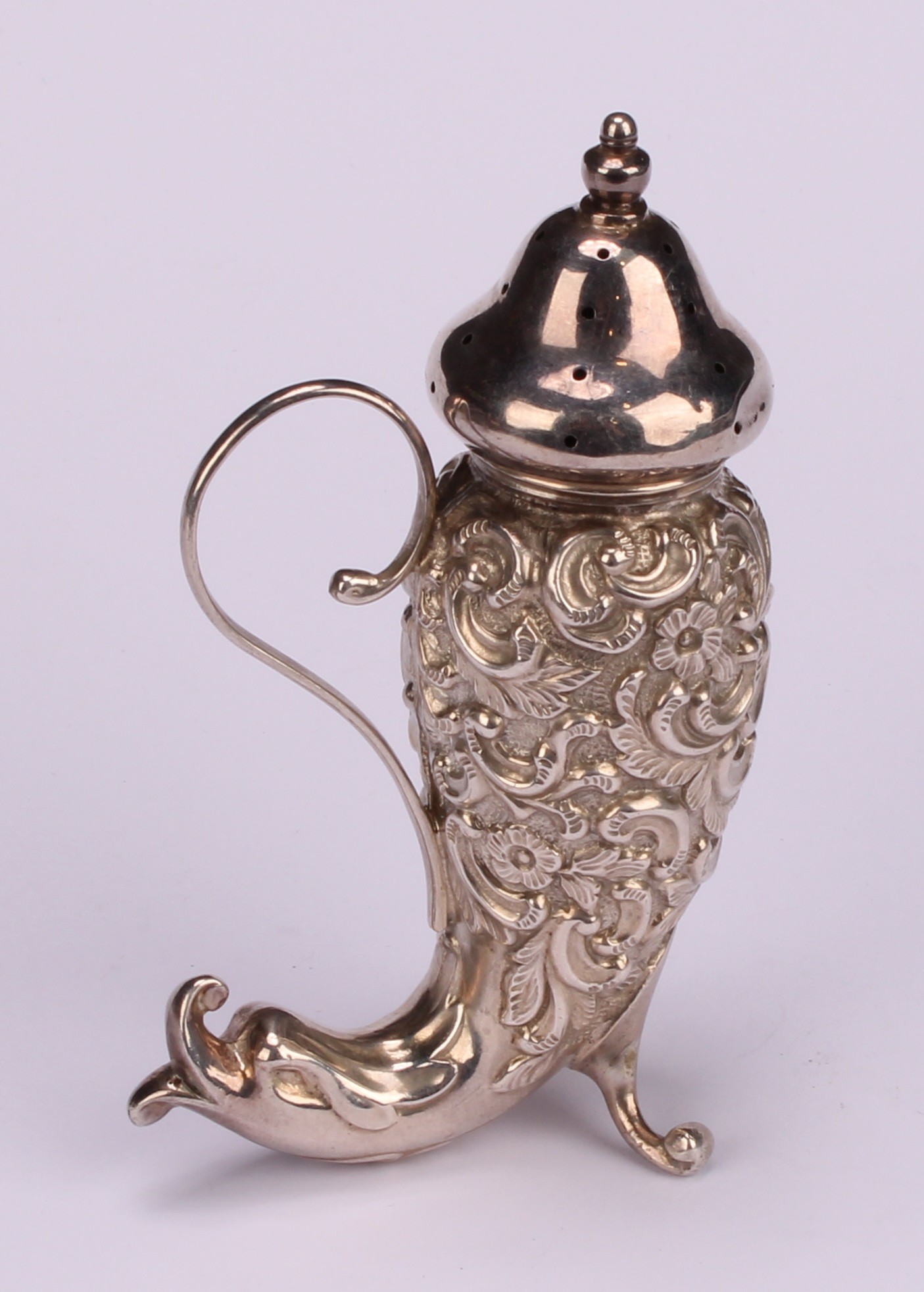 An Edwardian silver pepper, embossed with flowers and scrolling foliage, terminating in a dolphin, - Image 4 of 9