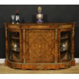 A Victorian gilt metal mounted walnut and marquetry credenza, slightly oversailing top above a panel