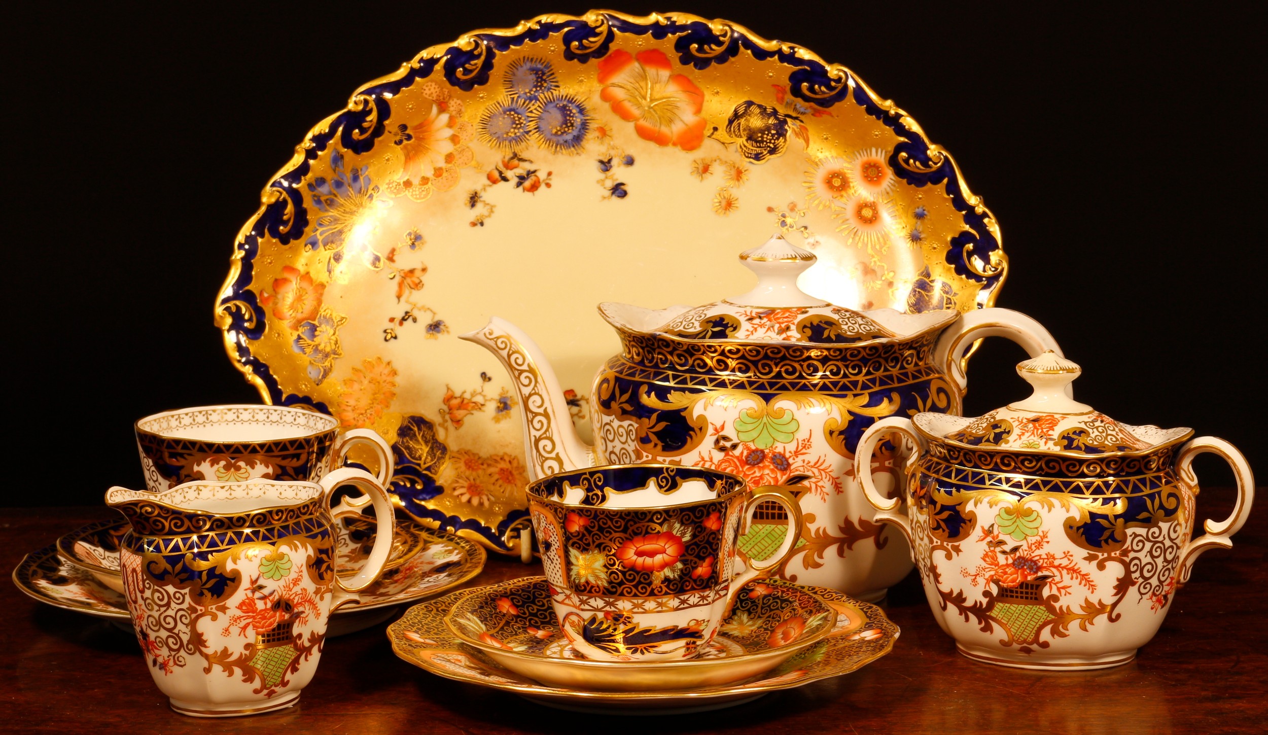 A Royal Crown Derby Imari 3788 pattern teapot, sucrier and cover, milk jug, registration number