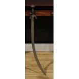 A 19th century Indian talwar, 72cm curved fullered blade with armourer’s mark, steel hilt with lotus