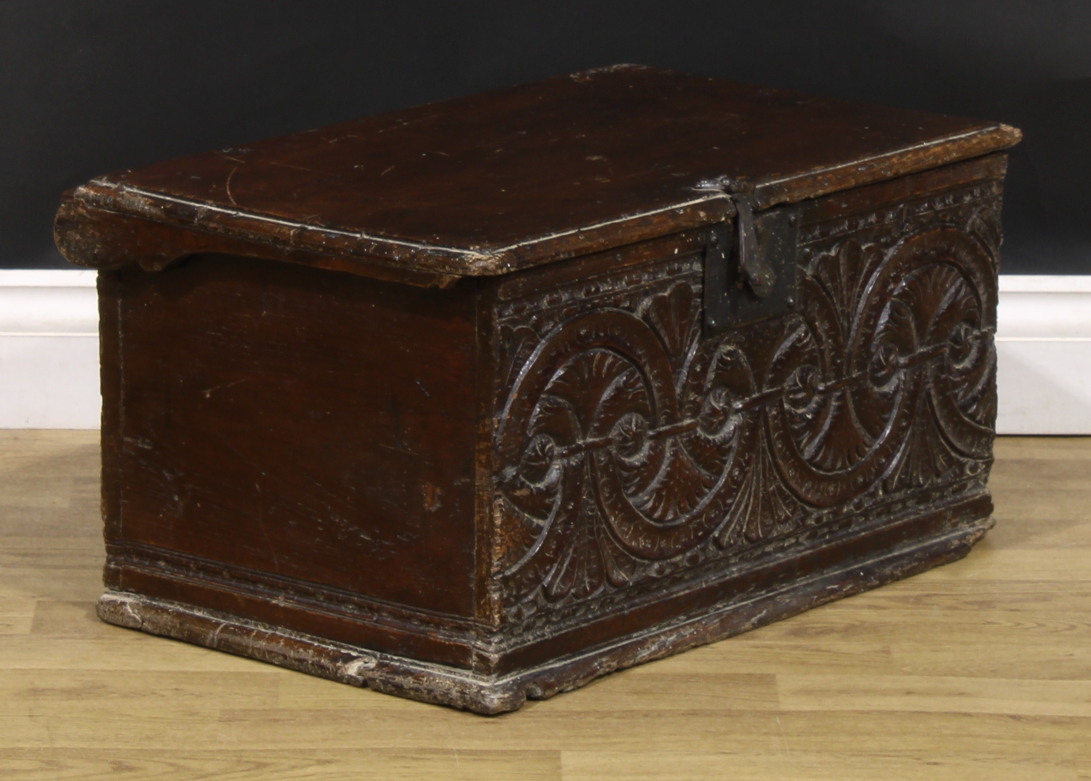 A 17th/early 18th century oak six-plank boarded table box, hinged cover, the front carved with - Image 2 of 5