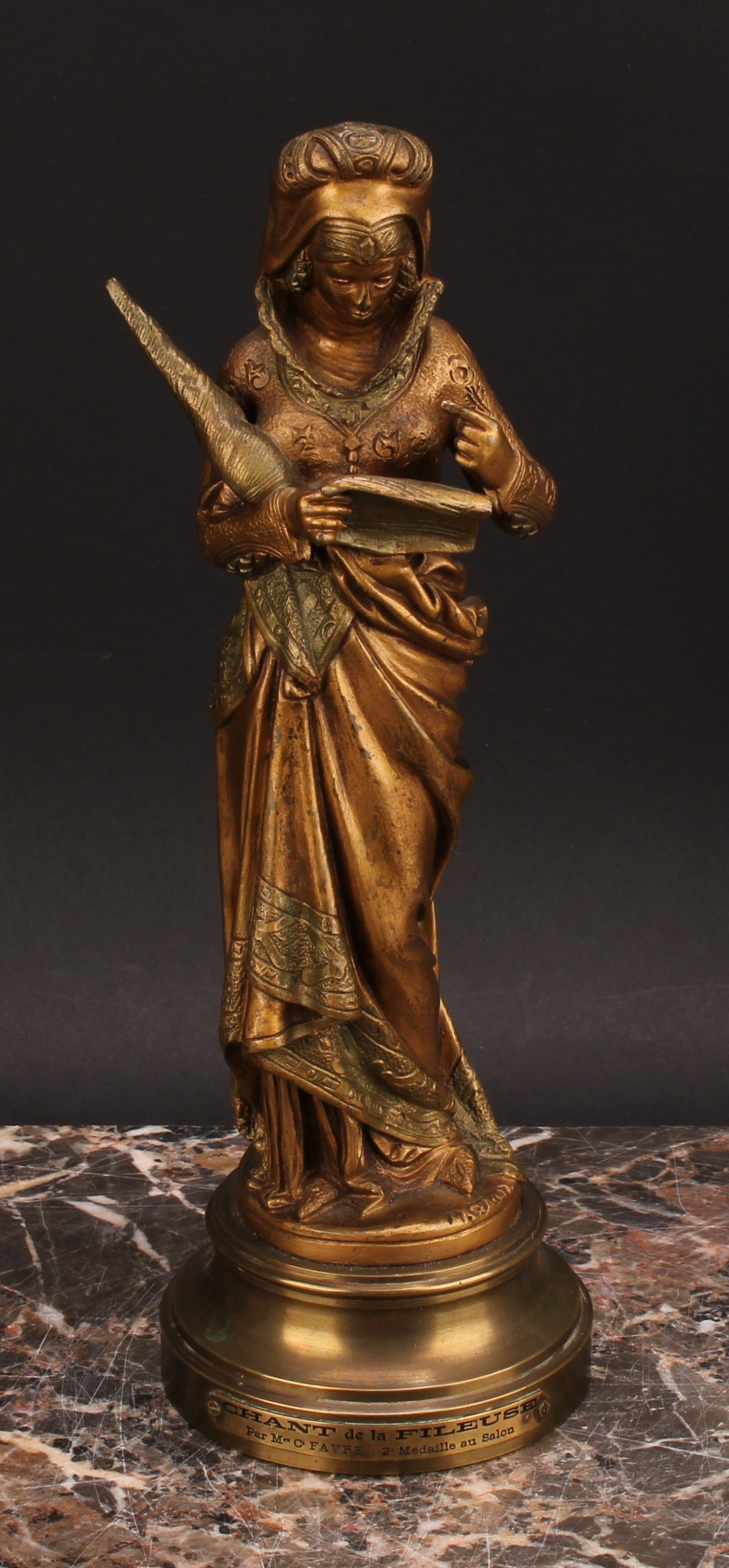 After Maurice Constant Favre (French, 1875-1919), a gilt bronze, Chant de la Fileuse, depicting a - Image 2 of 6