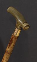 An early 20th century novelty walking stick, by Brigg, London, the L-shaped horn handle as a