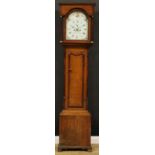 A George III mahogany and oak longcase clock, 31cm arched painted dial inscribed Jno Rogers,