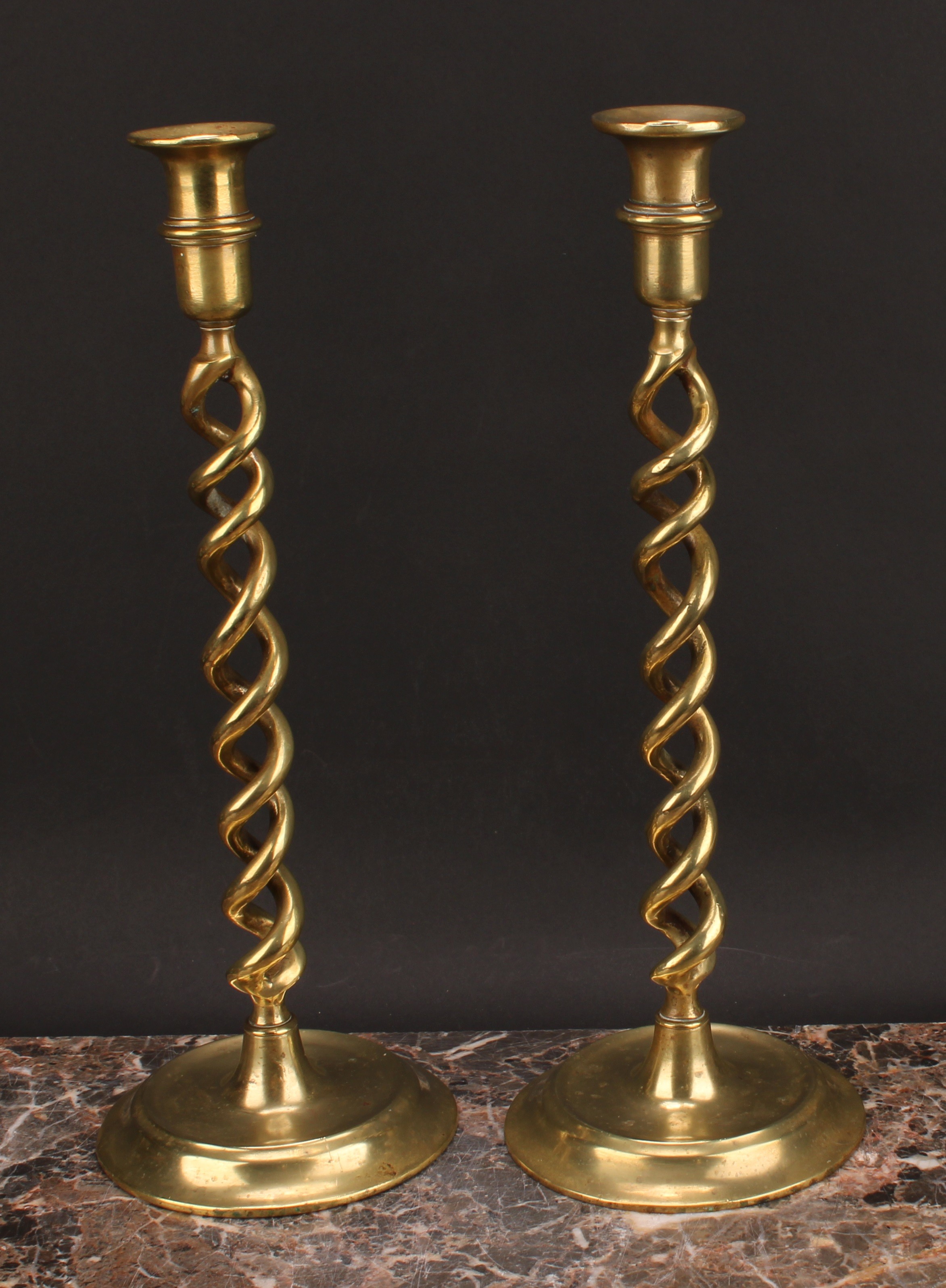 A pair of Victorian brass open-twist table candlesticks, dished circular bases, 37cm high, c.1880 - Image 2 of 4