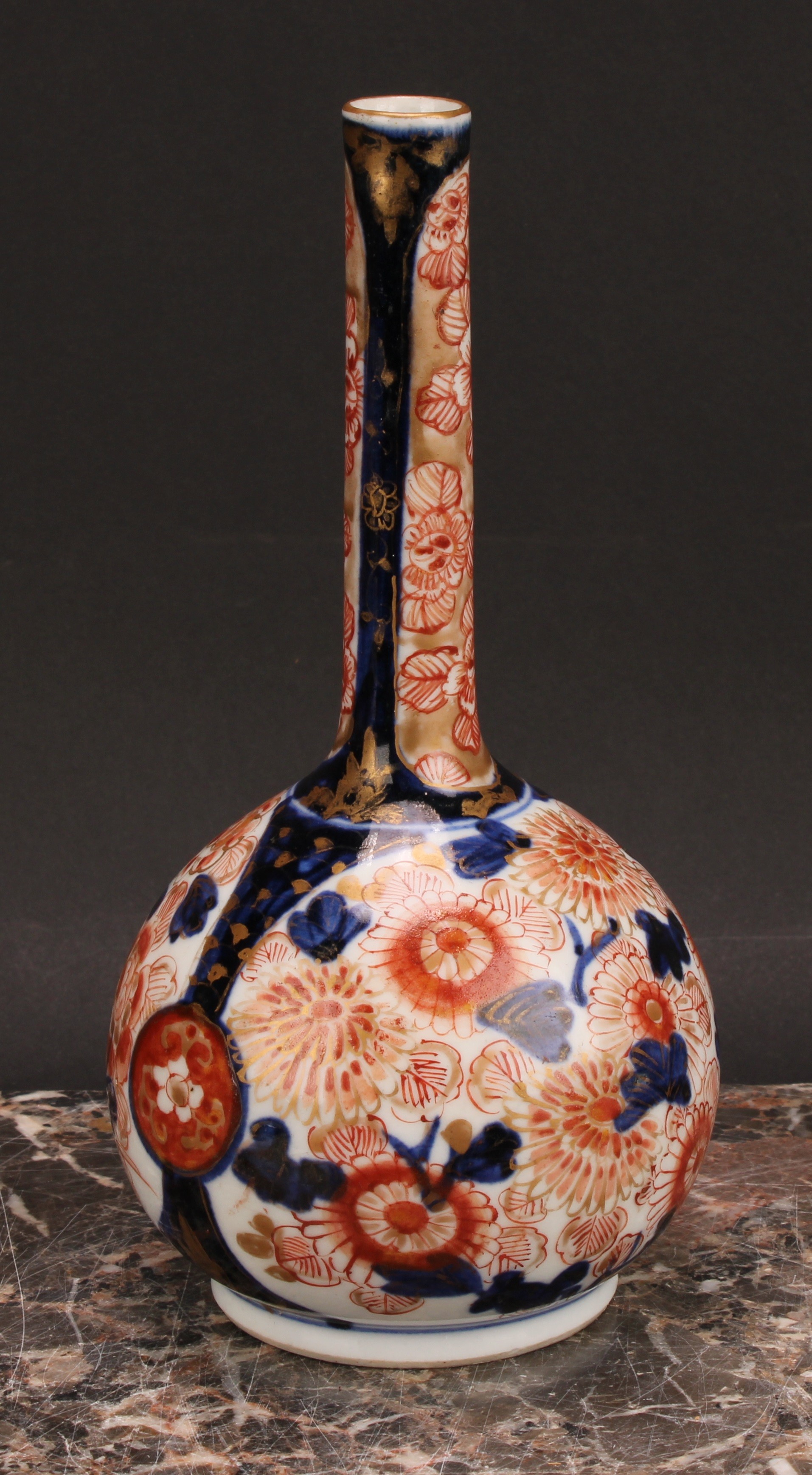 A pair of Japanese porcelain bottle vases, decorated in the Imari palette with peonies and - Image 7 of 8