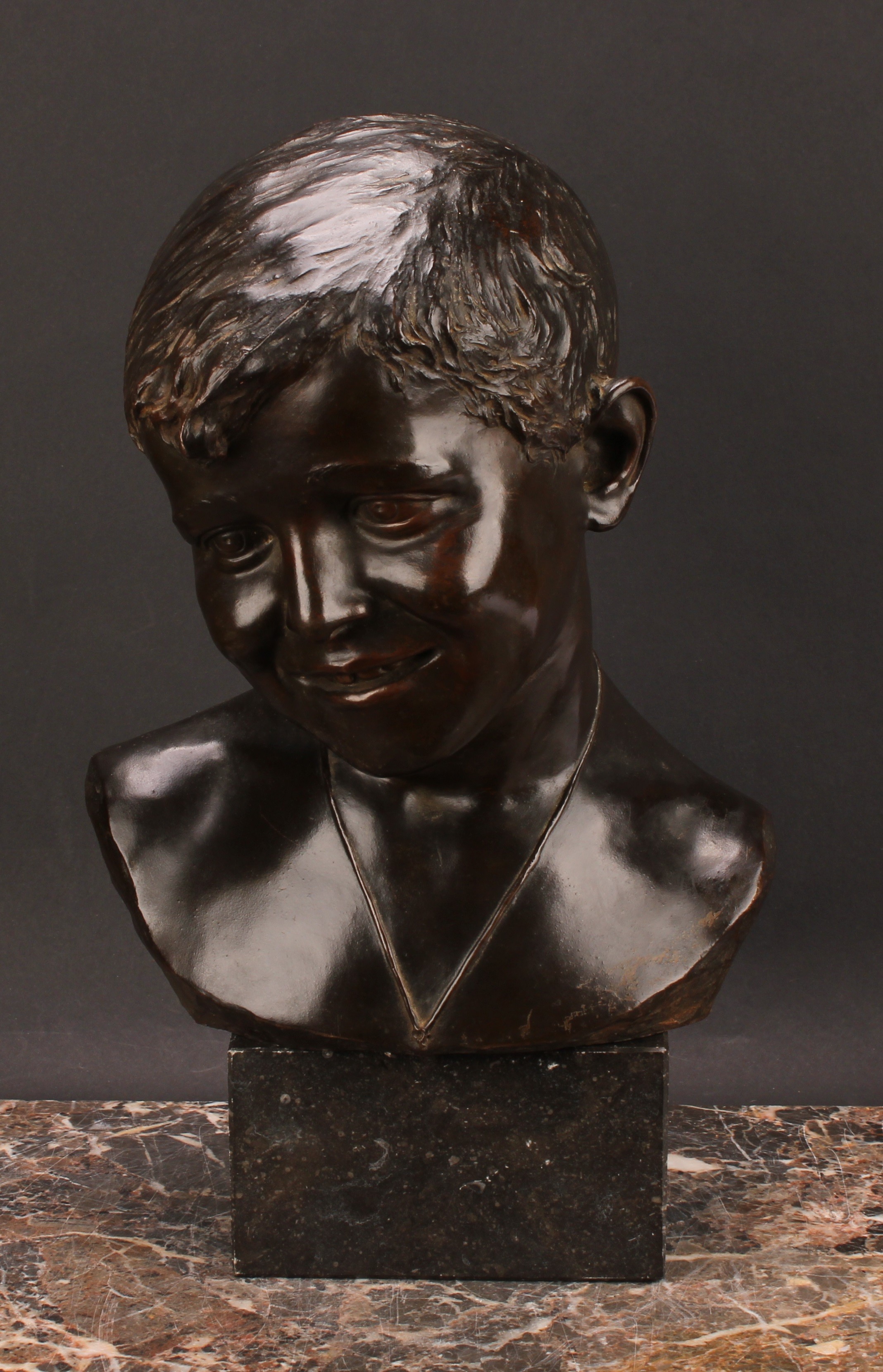 Eduardo Rossi (1867-1926), a brown patinated bronze, bust of a young boy, signed in the maquette, - Image 2 of 5