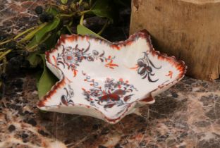 A Plymouth leaf shaped pickle dish, painted with flowers in underglaze blue, picked out in overglaze