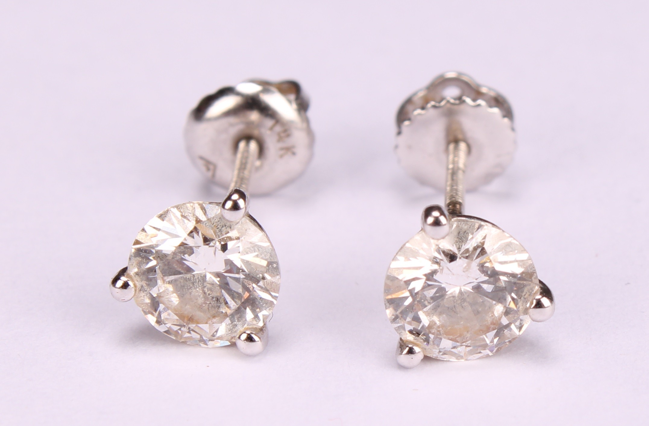 A pair of 14ct white gold diamond stud earring, each diamond approx. 5.8mm, approx. total weight 1. - Image 2 of 4