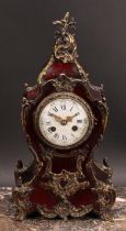 A Louis XV Revival gilt metal mounted simulated tortoiseshell mantel clock, 8cm circular enamel dial