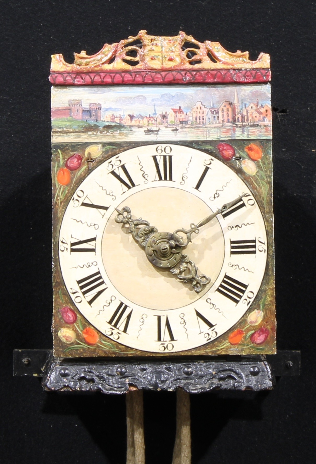 An early 19th century and later Dutch hook and spike Zaanse clock, 17cm painted dial inscribed