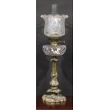 An Art Nouveau period brass table oil lamp, Hink's Duplex No.2 burner, facetted clear glass font,