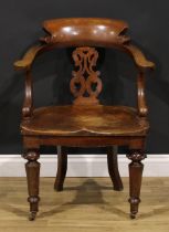 A Victorian oak desk chair, by Thomas Simpson & Sons, Halifax, Yorkshire (fl.1876-1954), badged,