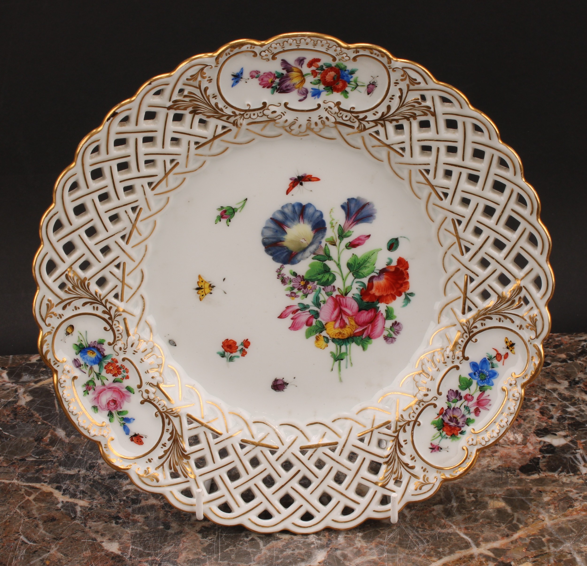 A set of six German porcelain shaped circular plates, decorated with flowers, pierced borders picked - Image 4 of 13