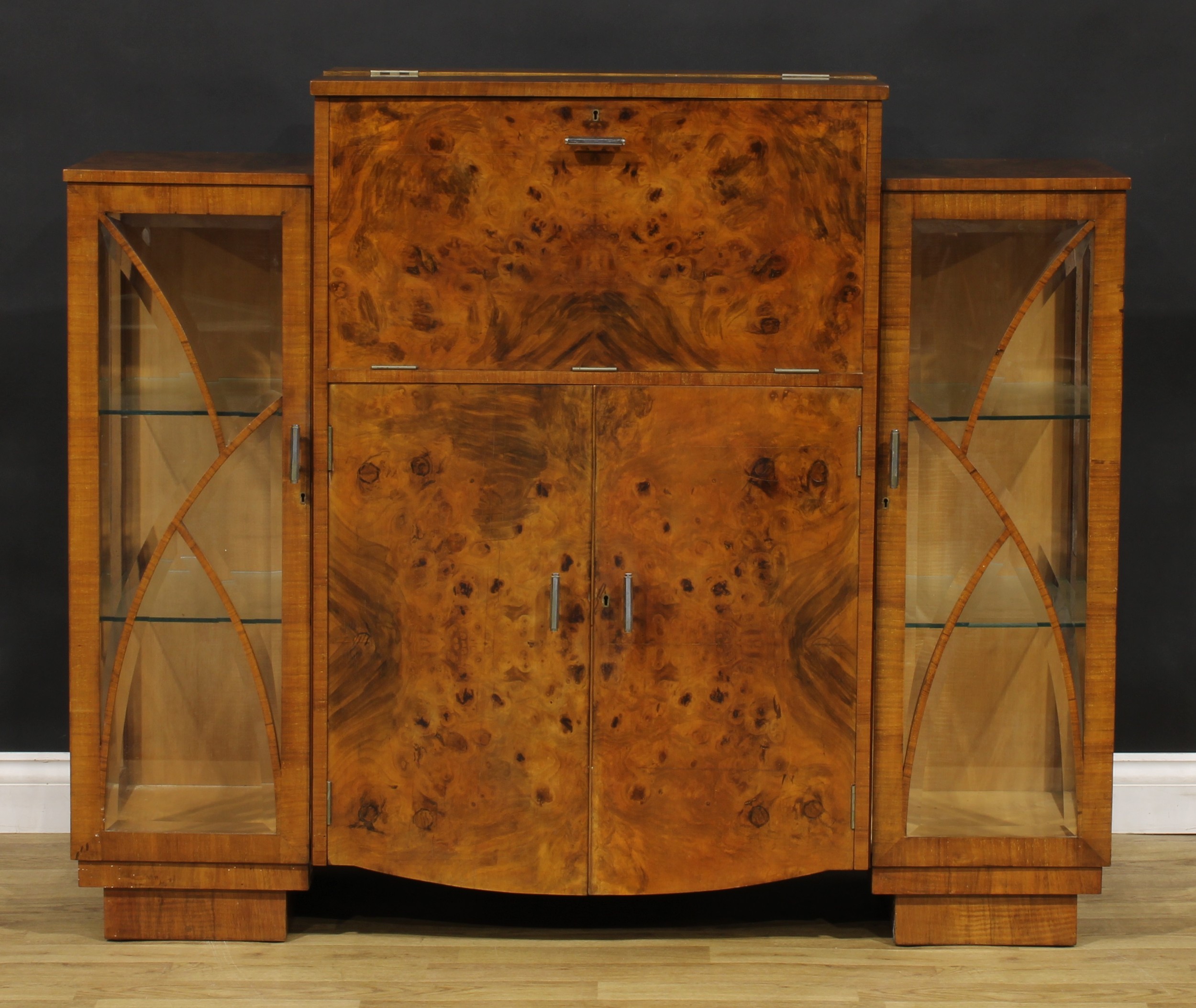 An Art Deco burr walnut cocktail cabinet, hinged top and fall front enclosing a fitted interior, - Image 2 of 6