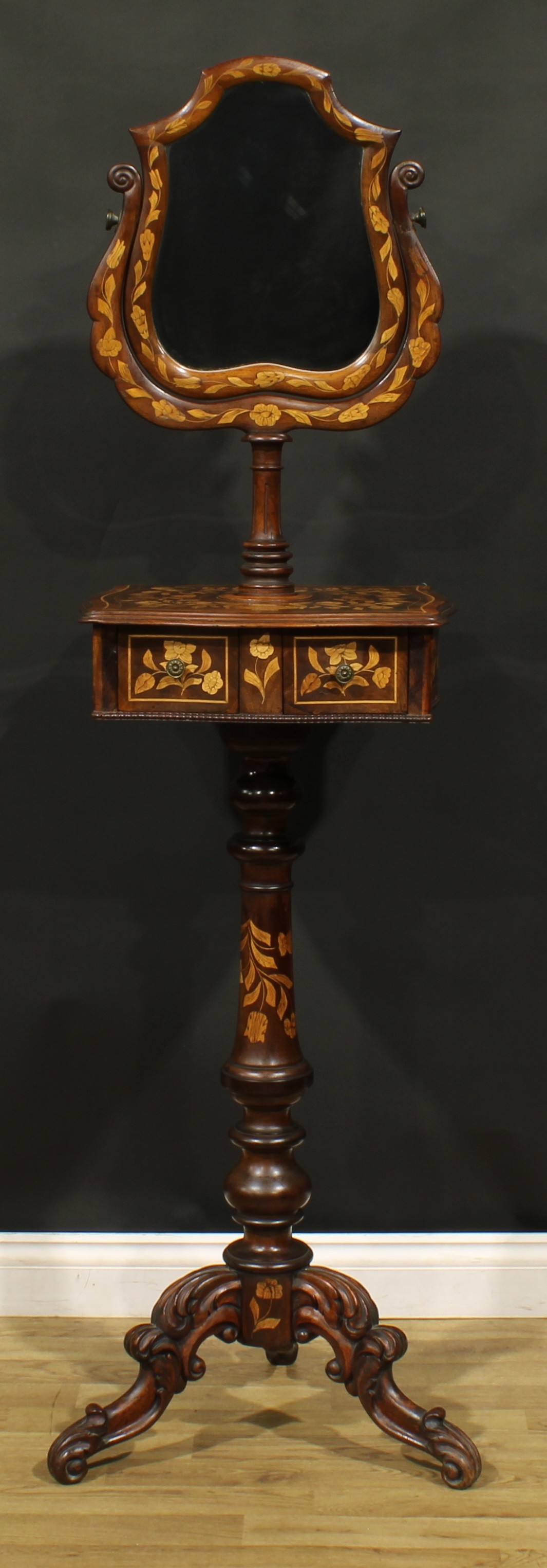 A 19th century Dutch marquetry tripod shaving stand, shaped mirror plate, serpentine square