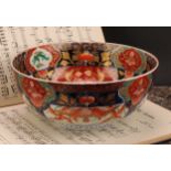A Japanese porcelain bowl, decorated in the Imari palette, 25cm diameter, Meiji period