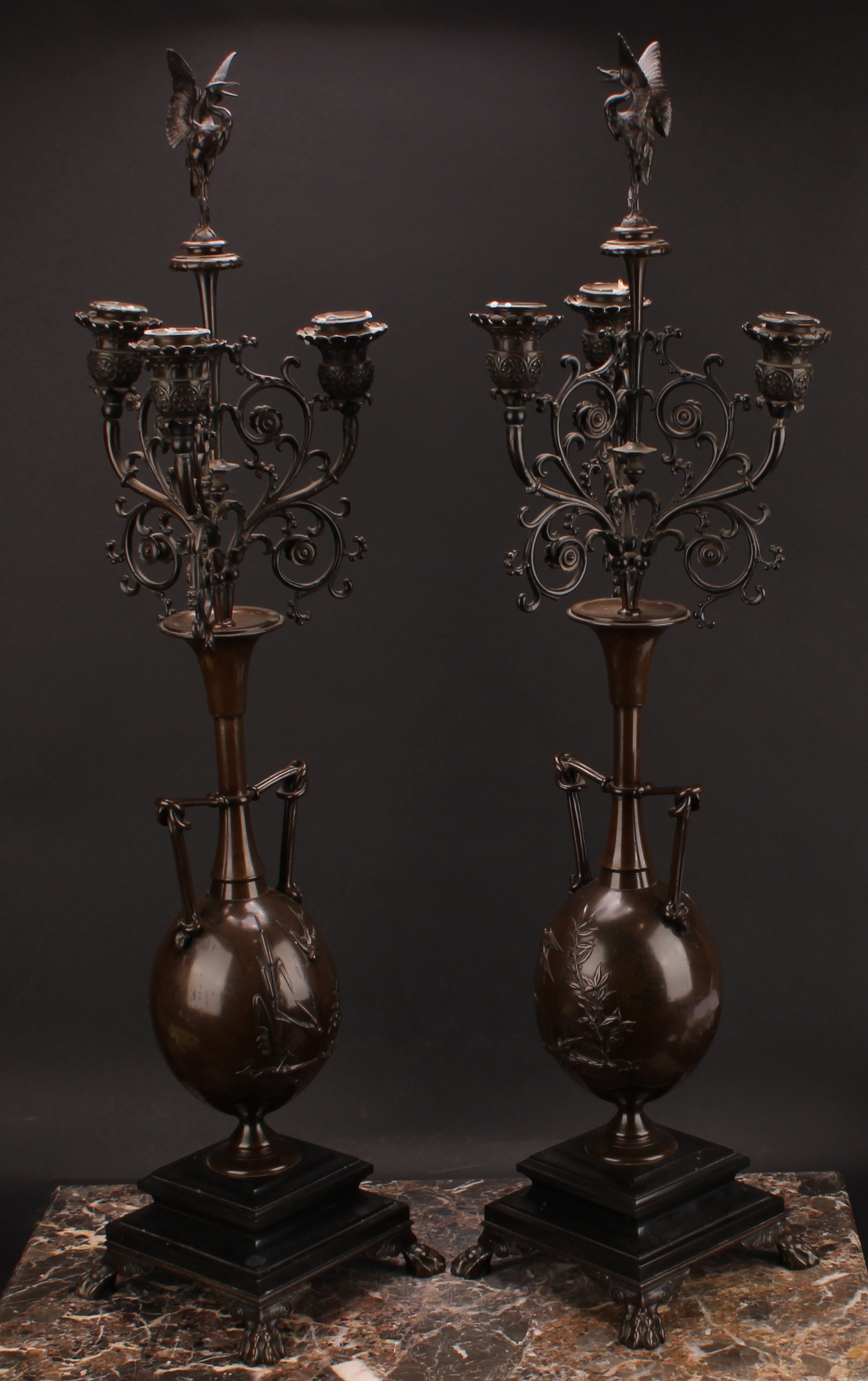 A pair of 19th century French brown patinated bronze table candelabra, stork finials, each vasular - Image 2 of 2