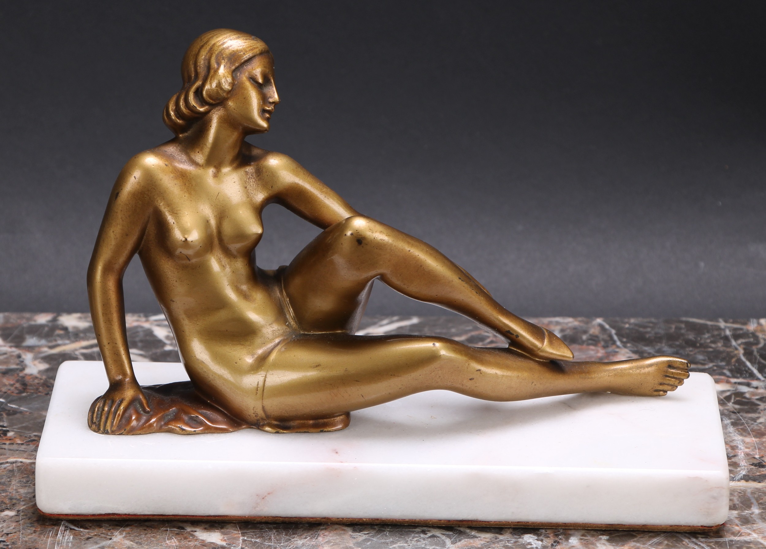 French School (second quarter 20th century), an Art Deco gilt patinated bronze, of a female nude,