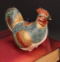 A Japanese satsuma teapot, as a cockerel, painted in polychrome and picked out in gilt, 18cm long,