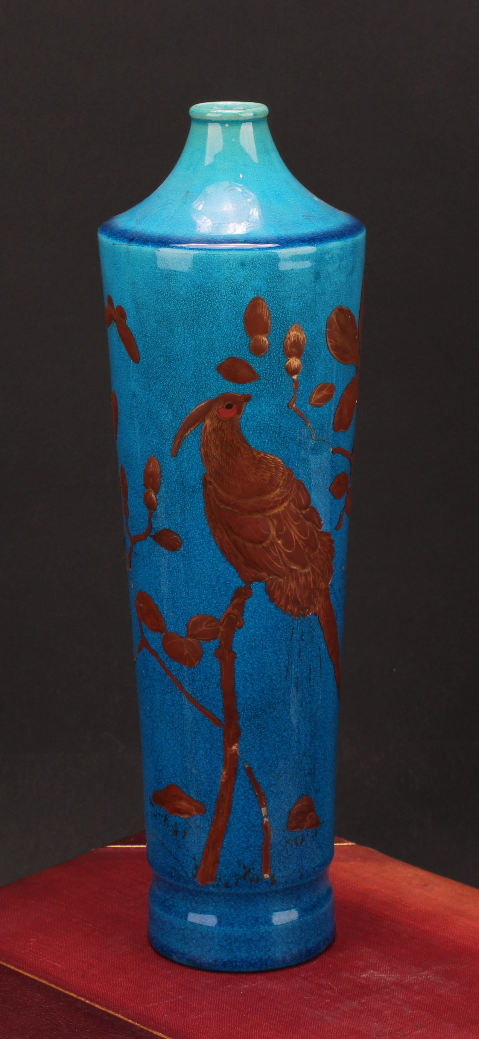 A Japanese Awaji tapered cylindrical vase, decorated in gilt with a bird, a butterfly and