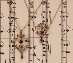 An Art Nouveau amethyst and split pearl scrolling heart pendant necklace, 9ct gold mount and