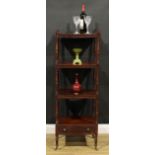 A George IV mahogany four-tier whatnot, turned supports, drawer to base, turned feet, brass casters,