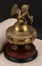A 19th century post regency stop fluted campana shaped inkwell and cover, cast with a seated