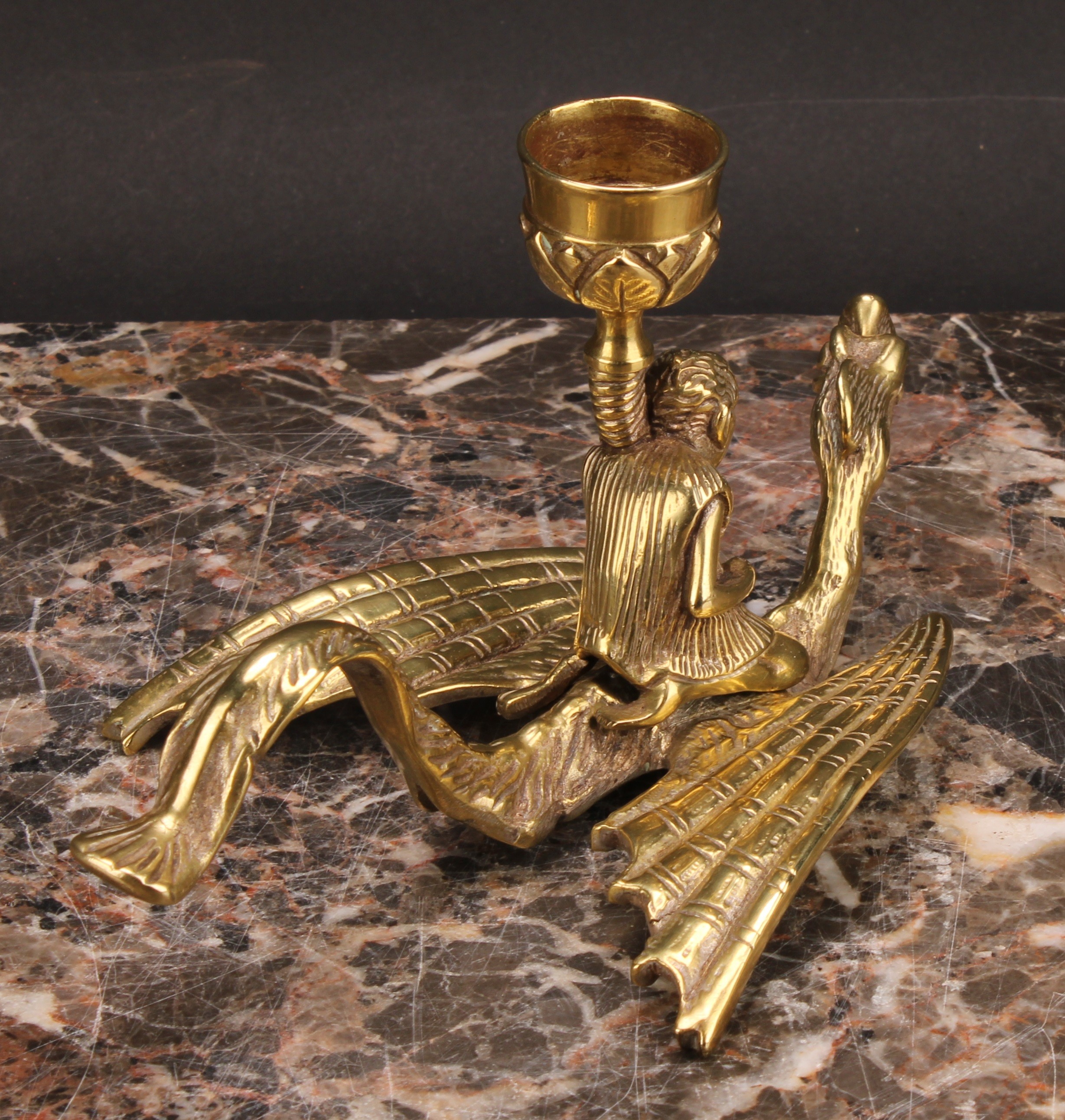 A 19th century brass chamberstick, cast as a figure riding a dragon, 9cm high - Image 4 of 4