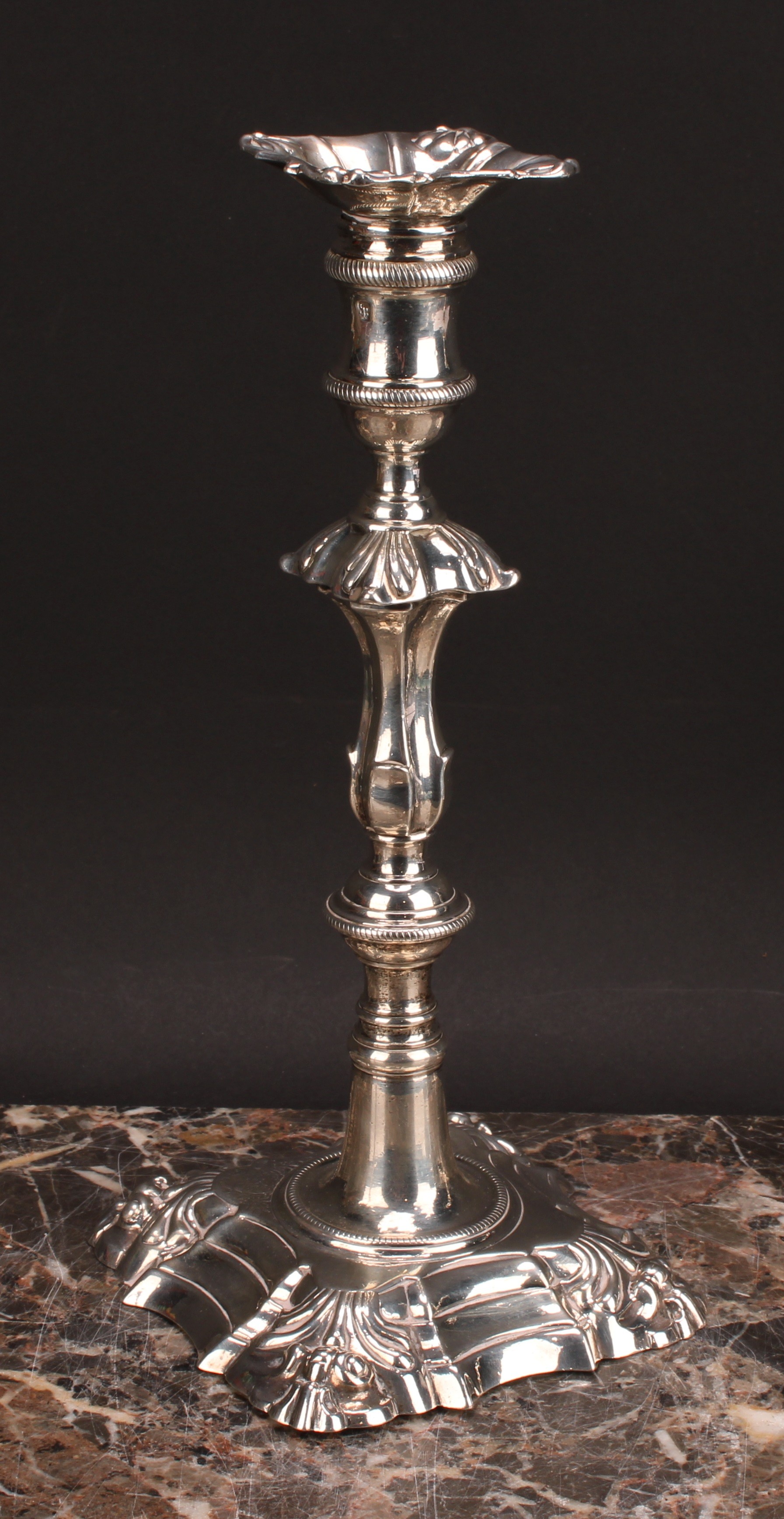 A composed set of four George II/early George III cast table candlesticks, detachable nozzles, - Image 10 of 14