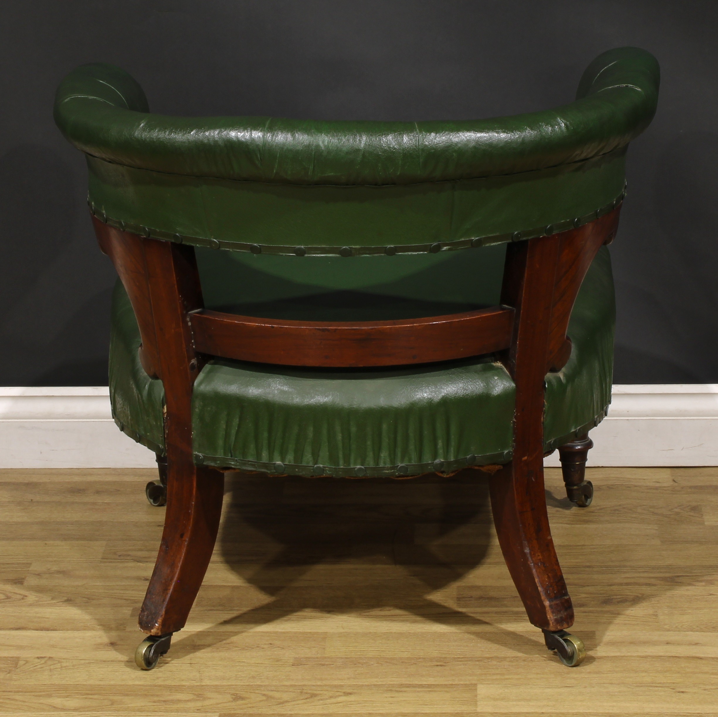 A Victorian rosewood and mahogany club library chair, stuffed-over upholstery, turned forelegs, - Image 4 of 4