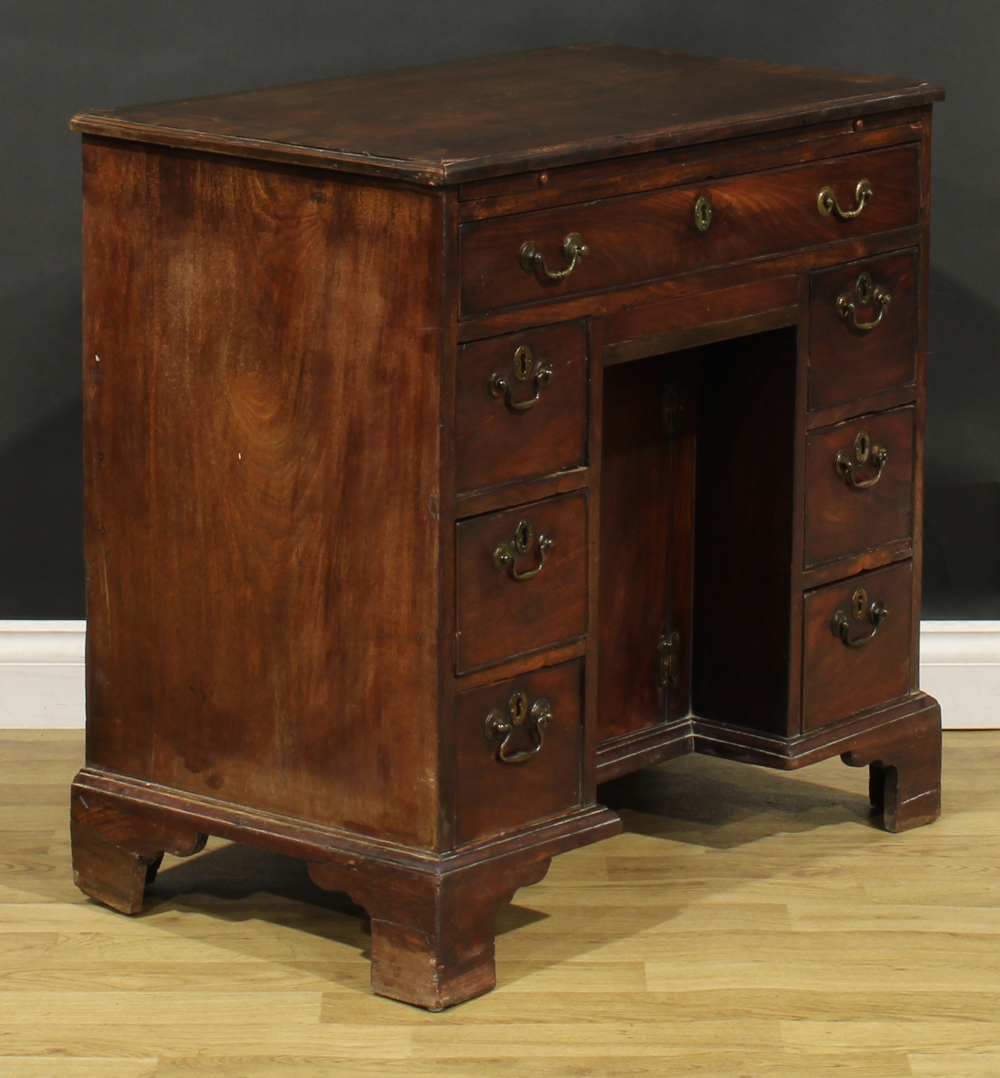 A George III mahogany kneehole desk, slightly oversailing top with moulded edge above a slide and - Image 4 of 8
