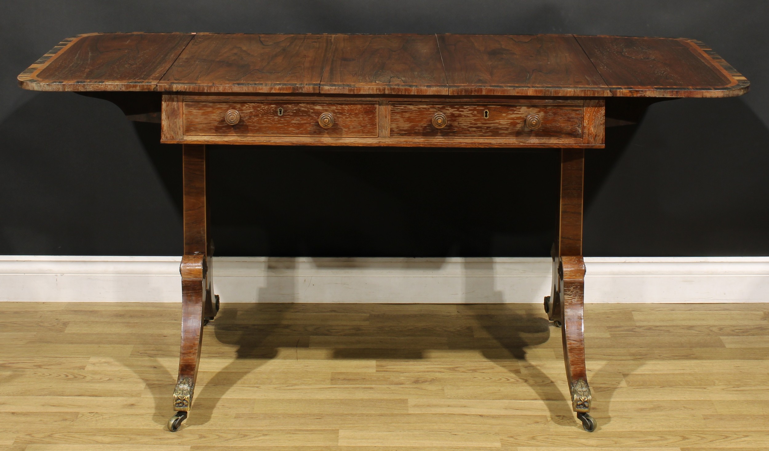 A Regency rosewood sofa table, crossbanded rounded rectangular top with fall leaves, above a pair of - Image 3 of 7
