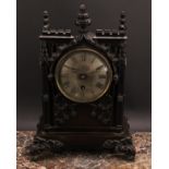 A Victorian Gothic Revival cast bronzed metal double-fusee bracket clock, 12.5cm circular silvered
