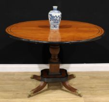 A 19th century Indo-Dutch jackfruit and ebonised centre table, circular tilting top turned and