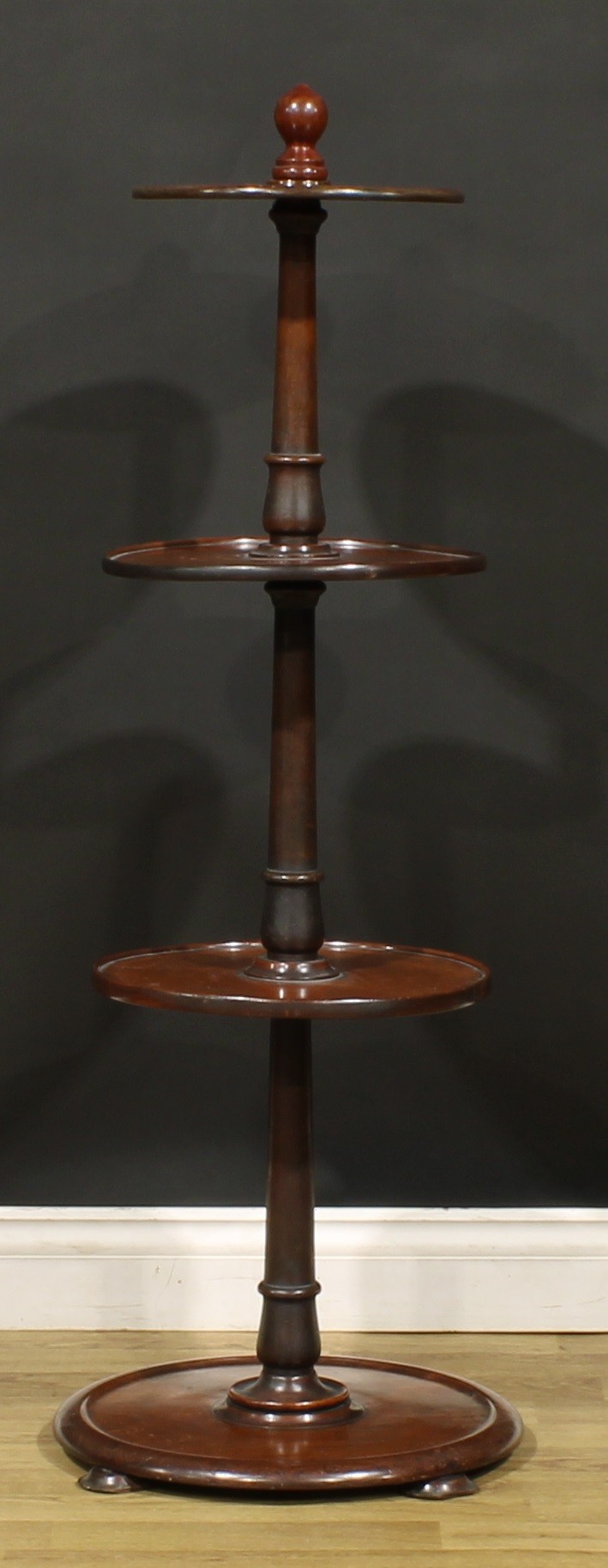 An early Victorian mahogany four-tier dumbwaiter, dished plateaux, shallow bun feet, 121.5cm high, - Image 2 of 3