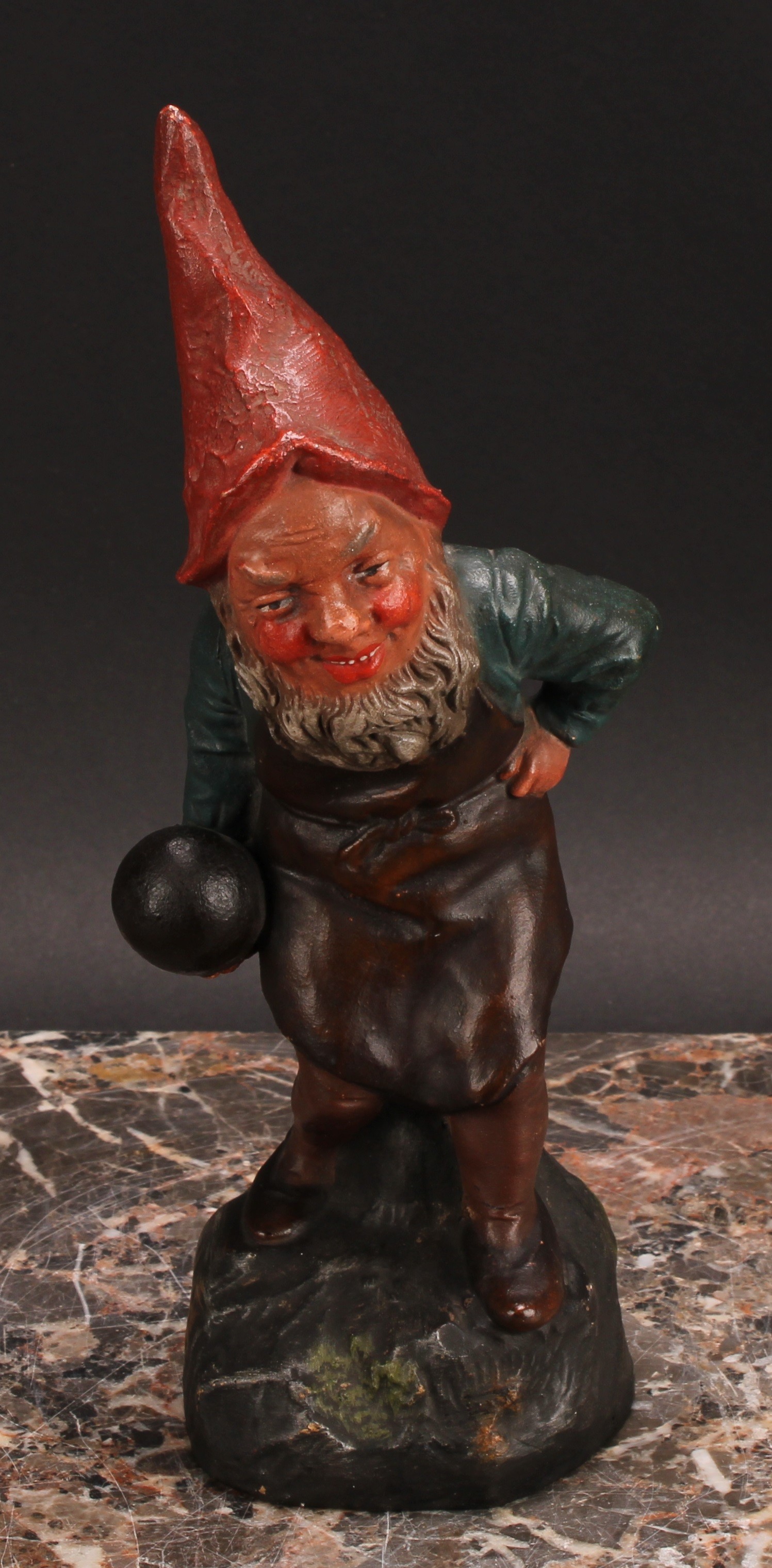 An Austrian terracotta gnome, by Johann Maresch, he stands, beside a barrel, holding a bowling wood, - Image 2 of 6