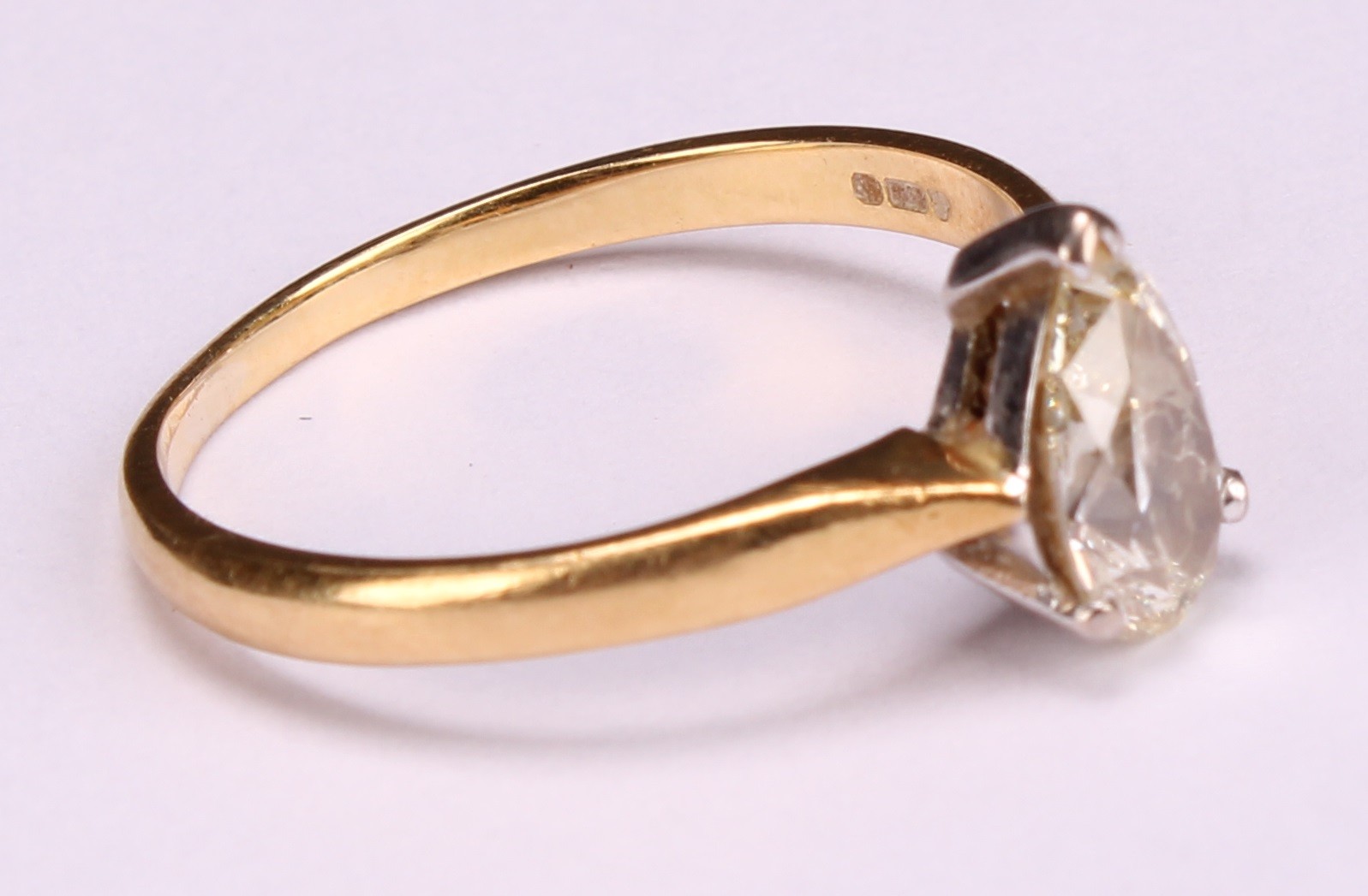An 18ct gold diamond solitaire ring, pear cut diamond, size O/P, marked .99ct, 2.68g - Image 3 of 4