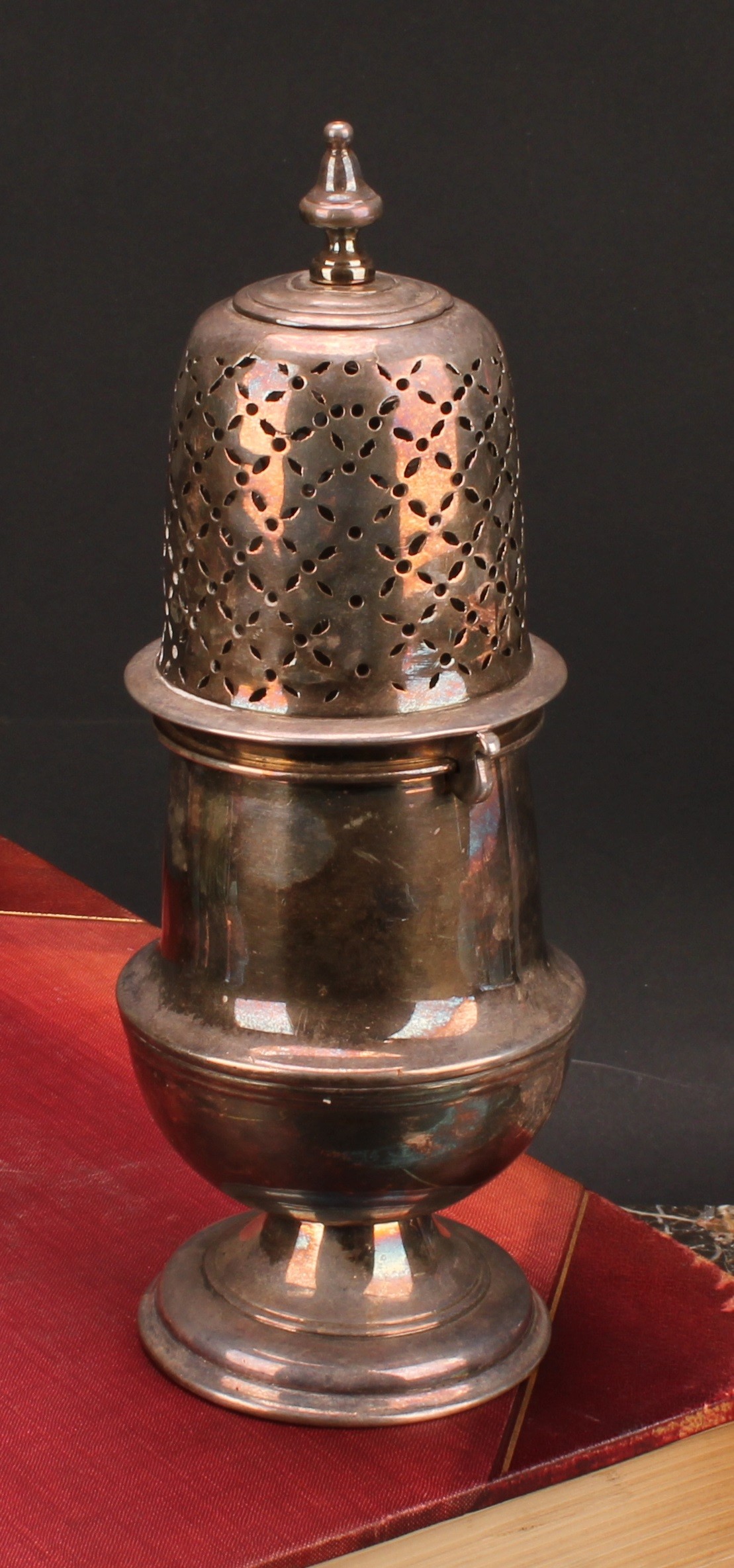An 18th century 'Teutonic' German silver plate or paktong baluster sugar caster, knop finial,